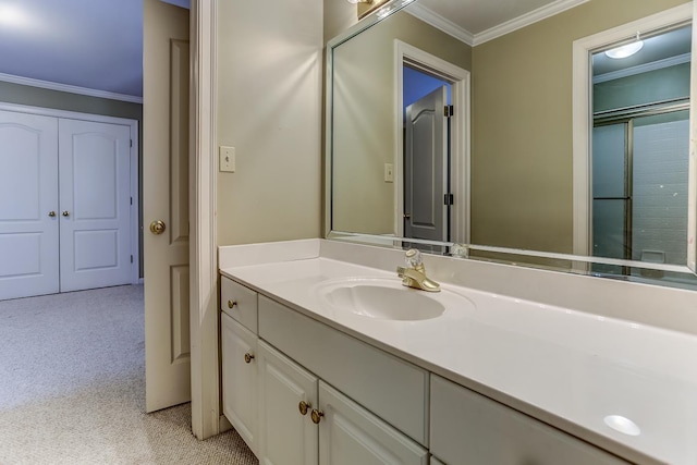 bathroom with vanity and ornamental molding