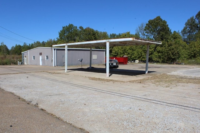 view of parking with a carport