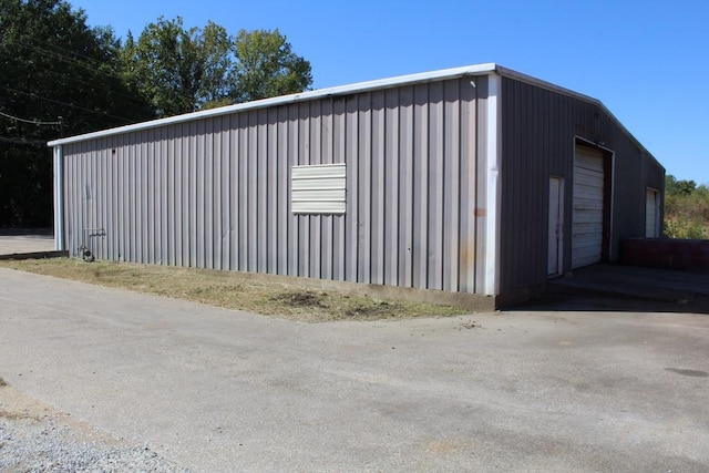 view of outbuilding featuring a garage