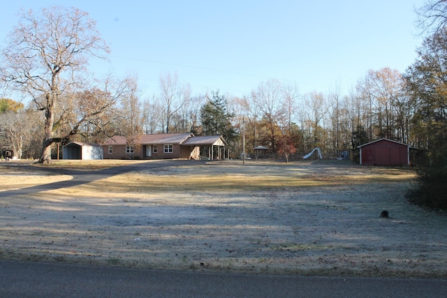 view of front of house with an outbuilding