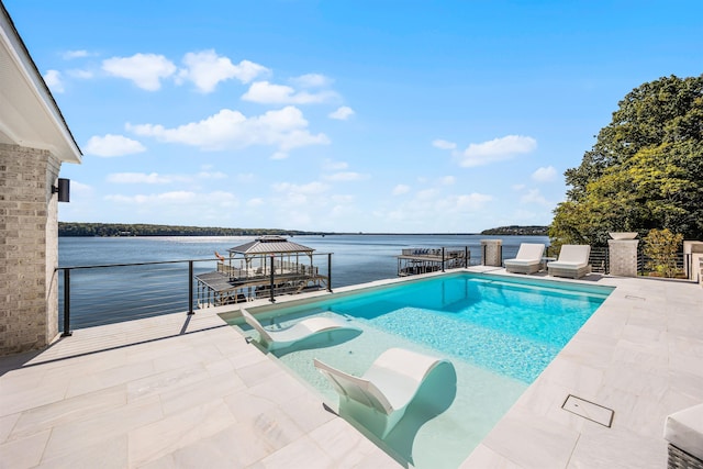 view of pool featuring a gazebo, a water view, and a patio