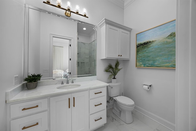 bathroom with vanity, toilet, an enclosed shower, and ornamental molding