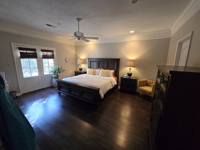 bedroom featuring access to exterior, french doors, a textured ceiling, ceiling fan, and dark hardwood / wood-style floors