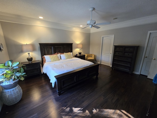 bedroom featuring ceiling fan, crown molding, dark wood-type flooring, and a textured ceiling