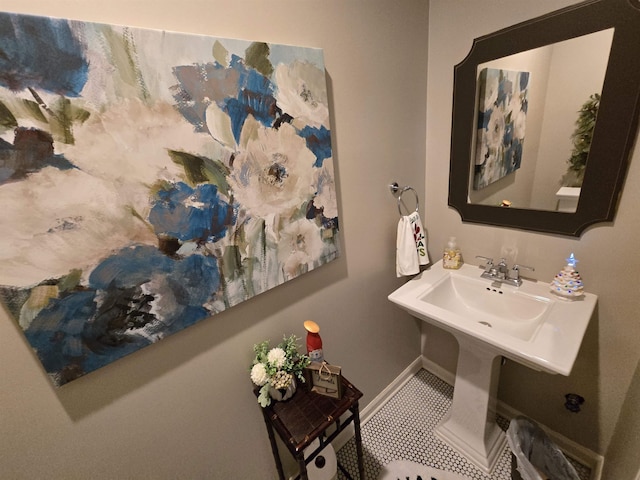 bathroom with tile patterned floors