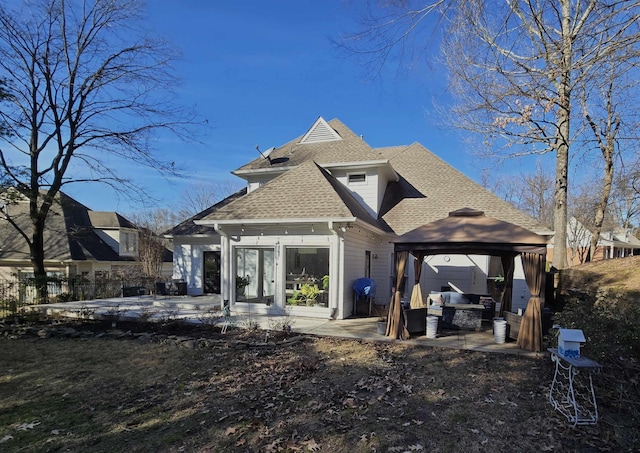 back of house featuring a gazebo and a patio area