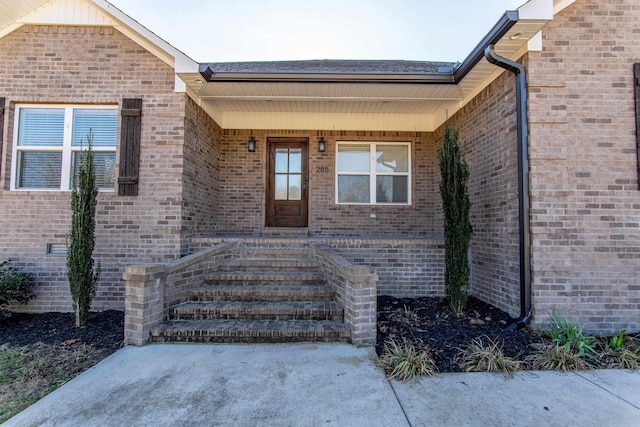 entrance to property with covered porch