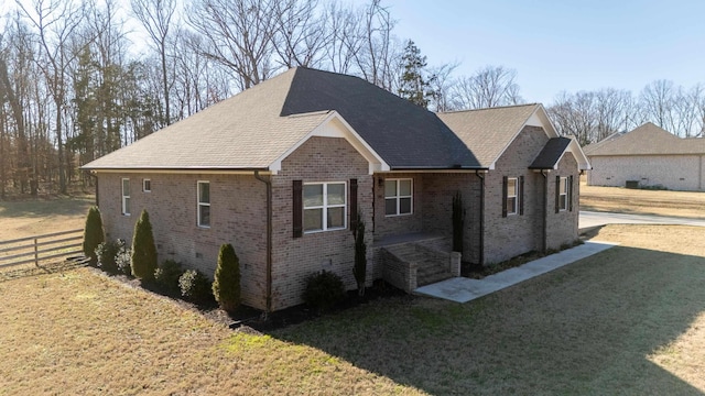 view of property exterior with a yard