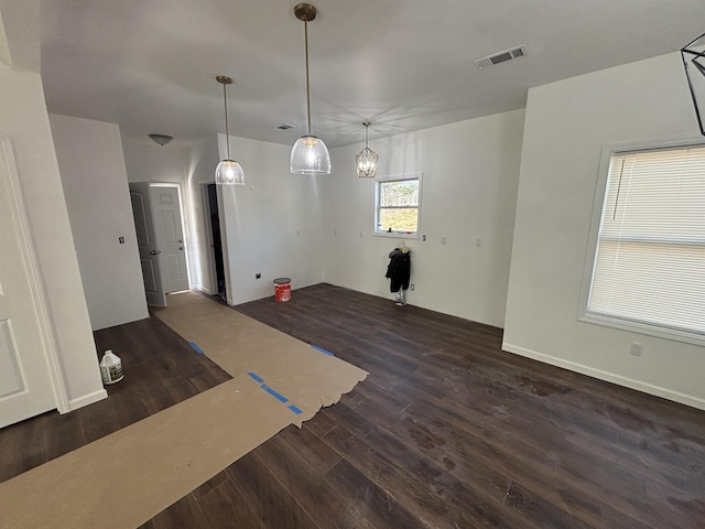 interior space with dark hardwood / wood-style flooring