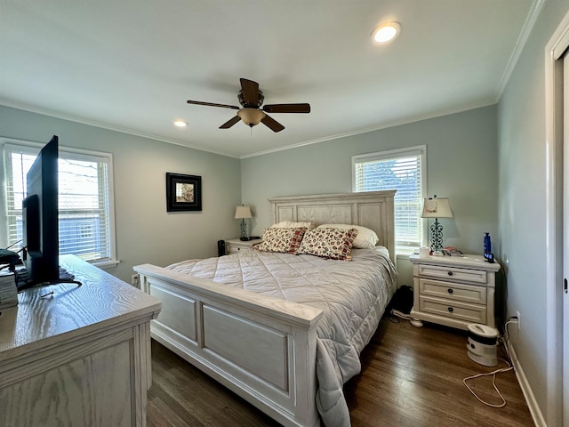 bedroom with ceiling fan, dark hardwood / wood-style floors, and ornamental molding