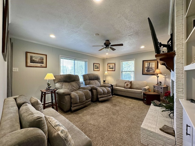 living room featuring a textured ceiling, light colored carpet, and crown molding