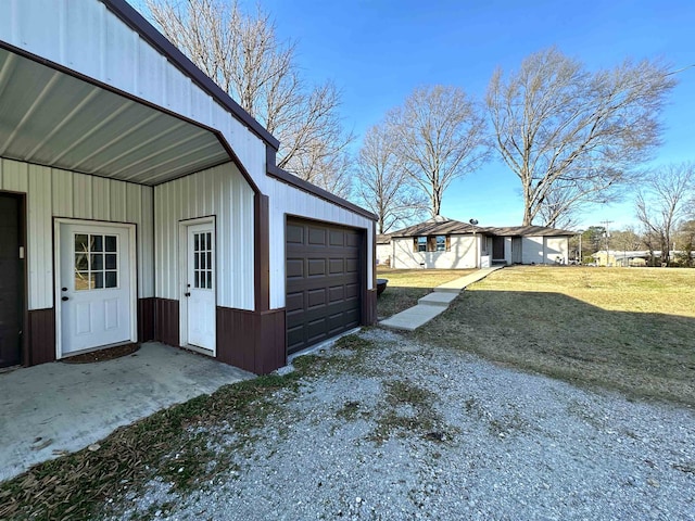 garage with a lawn