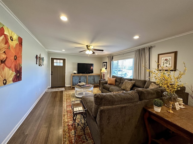 living room featuring dark hardwood / wood-style flooring, ceiling fan, and ornamental molding