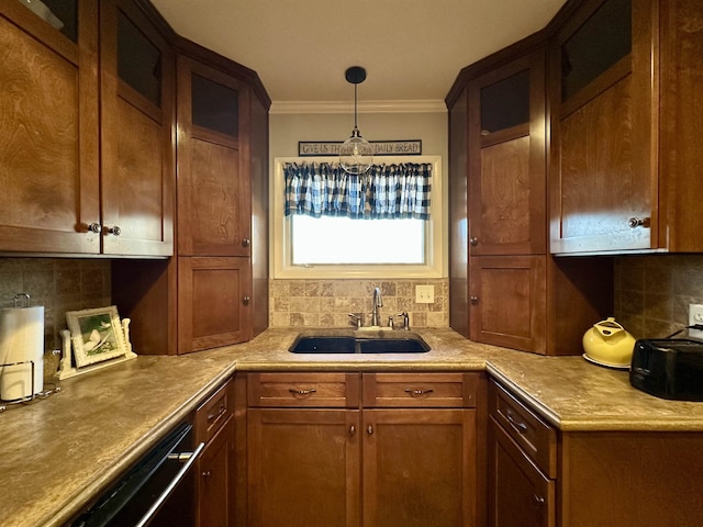 kitchen featuring dishwasher, sink, tasteful backsplash, crown molding, and pendant lighting