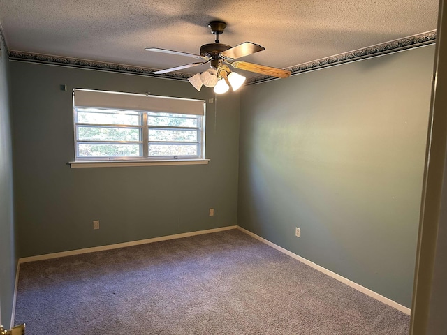 carpeted empty room featuring a textured ceiling and ceiling fan