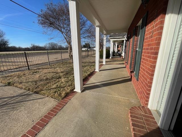 view of patio featuring covered porch