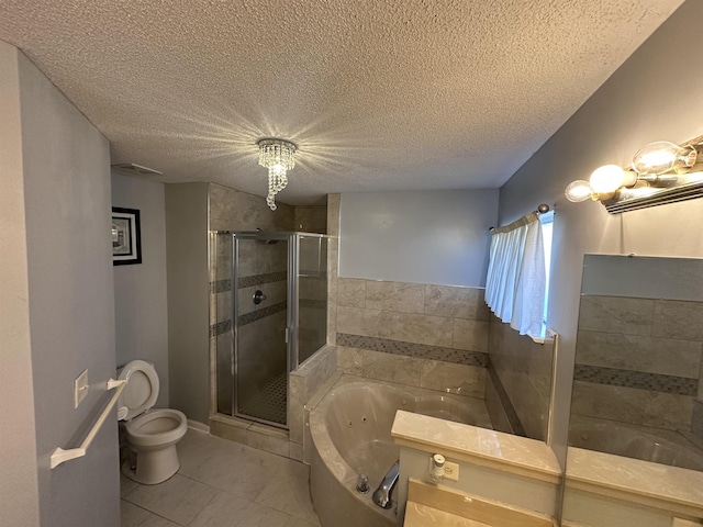 bathroom with tile patterned floors, toilet, a textured ceiling, and independent shower and bath