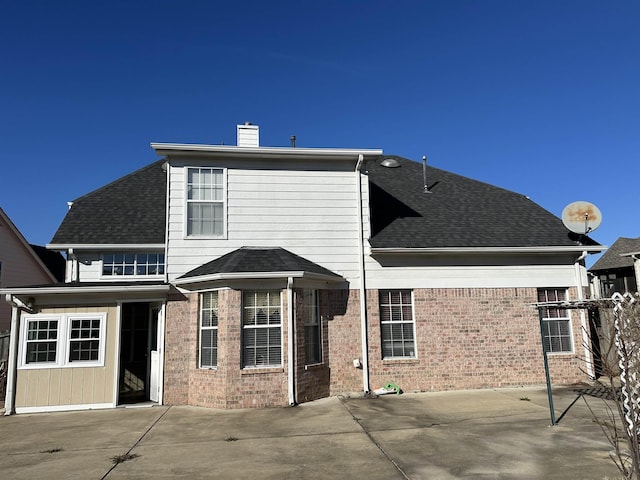 back of property featuring a patio area