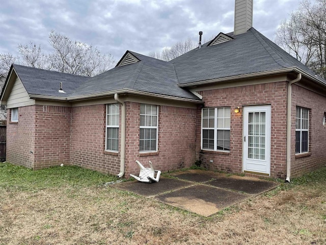 back of house featuring a patio area