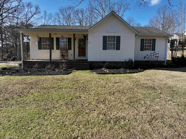 single story home with covered porch and a front yard