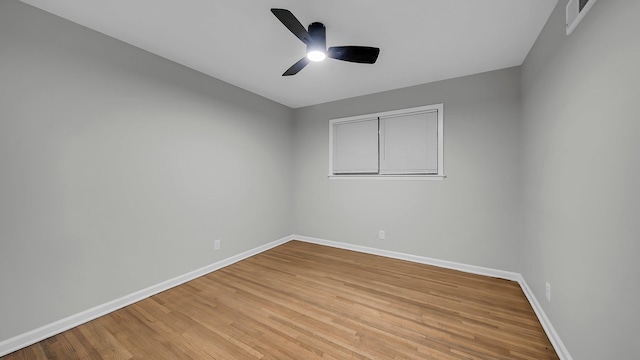 unfurnished room featuring ceiling fan and light hardwood / wood-style floors