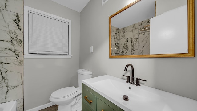 full bathroom featuring shower / bathing tub combination, vanity, and toilet