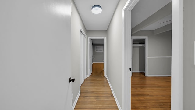 hallway with light wood-type flooring