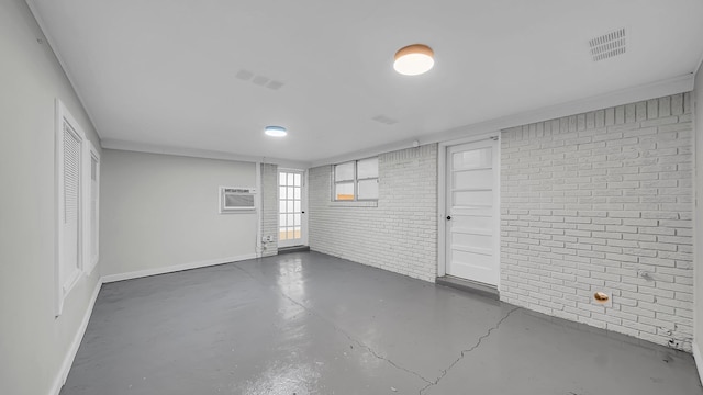 garage featuring a wall mounted AC