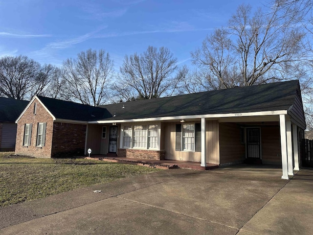 ranch-style home with a carport