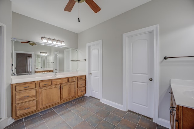 bathroom with vanity, tile patterned flooring, and ceiling fan