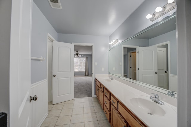 bathroom featuring tile patterned floors and vanity