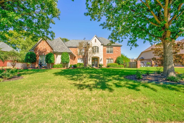 view of front of home featuring a front lawn