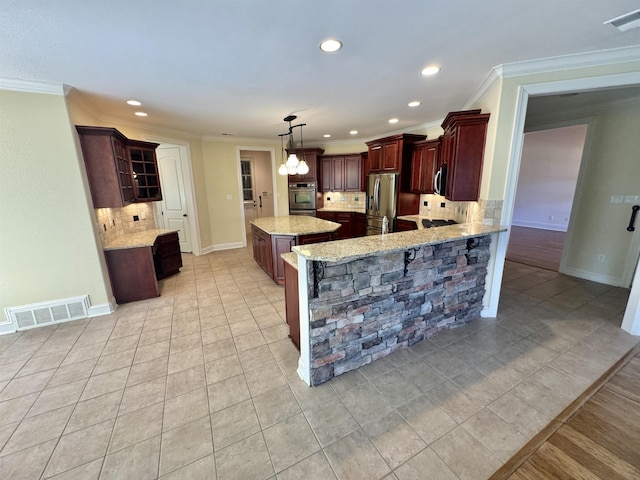 kitchen featuring decorative backsplash, appliances with stainless steel finishes, crown molding, and pendant lighting