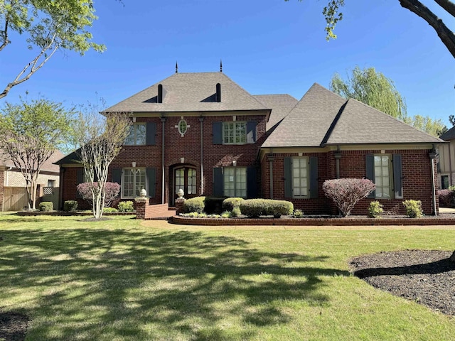 view of front of home with a front lawn