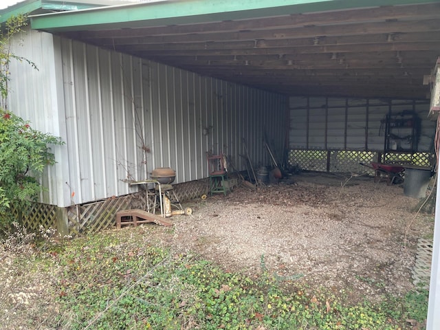 view of outdoor structure with a carport