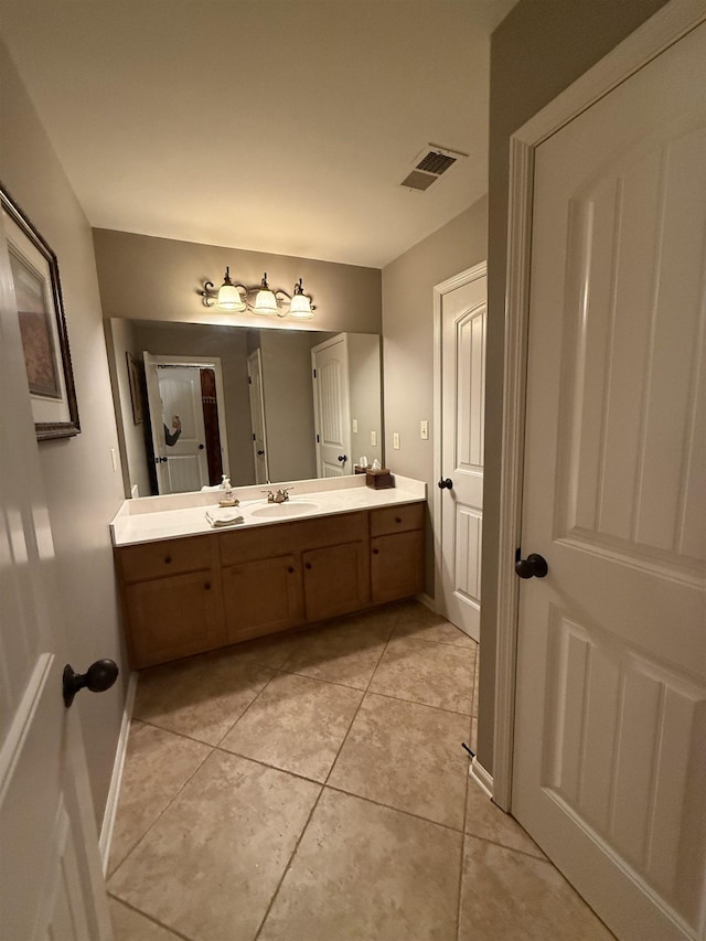 bathroom featuring vanity and tile patterned floors