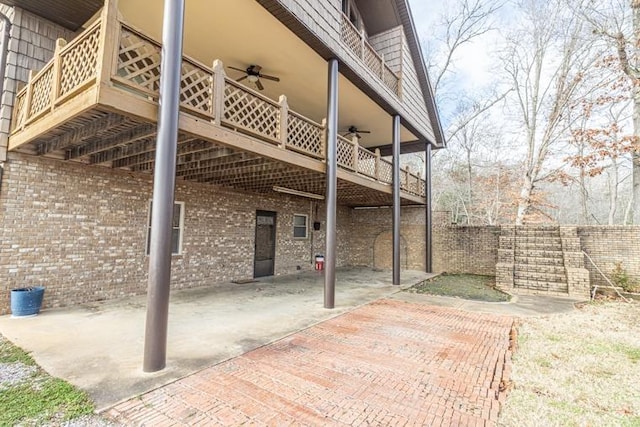 view of patio / terrace featuring ceiling fan and a wooden deck