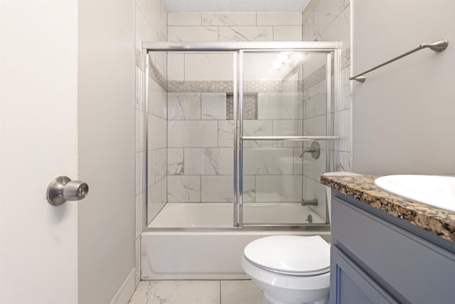 full bathroom with vanity, toilet, enclosed tub / shower combo, and a textured ceiling