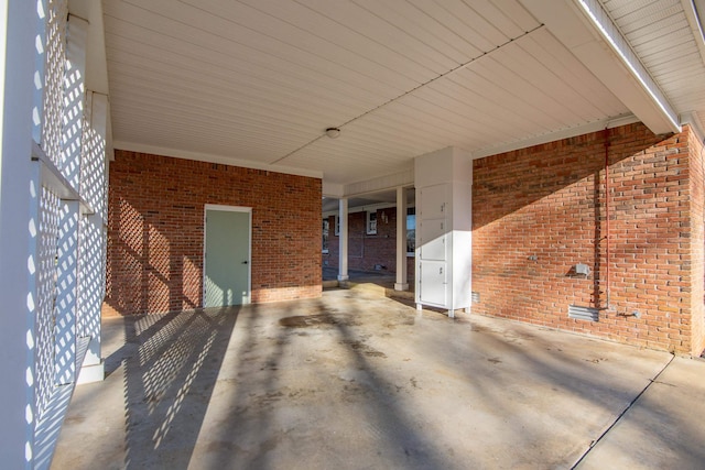 view of patio / terrace featuring a carport