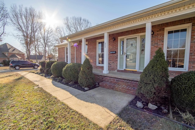 entrance to property with covered porch