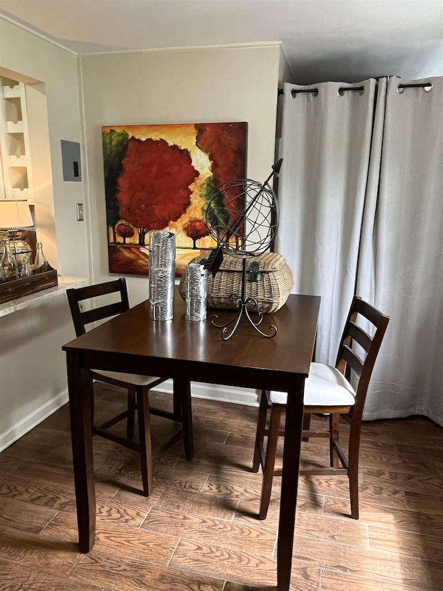 dining room with wood-type flooring