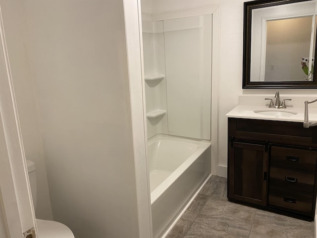 full bathroom featuring shower / bathing tub combination, vanity, and toilet