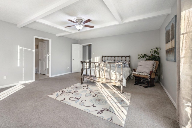 bedroom with beamed ceiling, ceiling fan, light colored carpet, and a textured ceiling