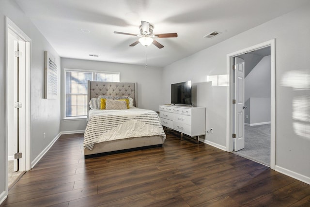 bedroom with ceiling fan and dark hardwood / wood-style flooring