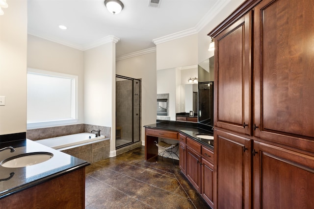 bathroom with plus walk in shower, crown molding, and vanity