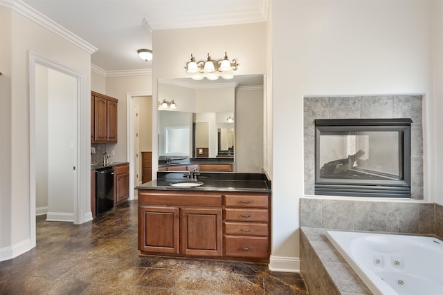 bathroom featuring a relaxing tiled tub, ornamental molding, a fireplace, and vanity