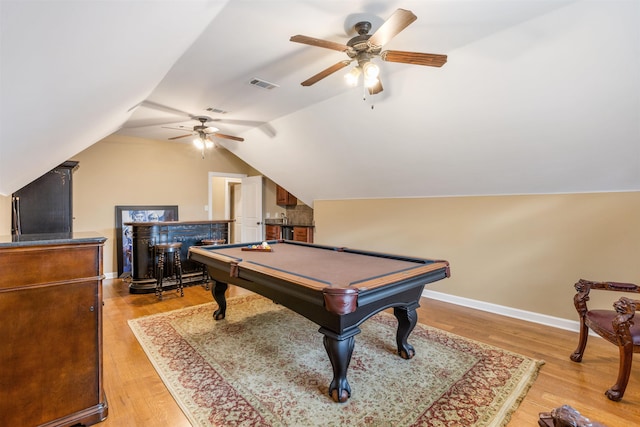 recreation room featuring vaulted ceiling, light hardwood / wood-style flooring, ceiling fan, and pool table