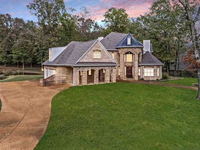 view of front of property with a yard