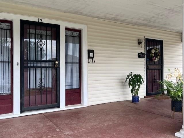 entrance to property with a porch