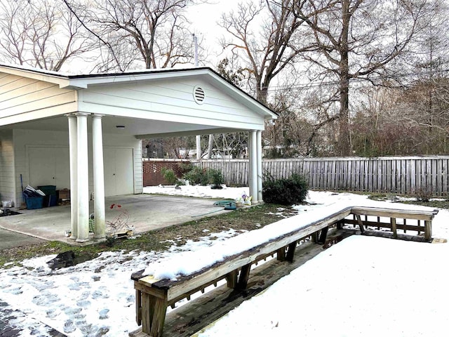 view of snow covered deck